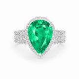 Pear emerald and diamond claw set 18k white gold ring