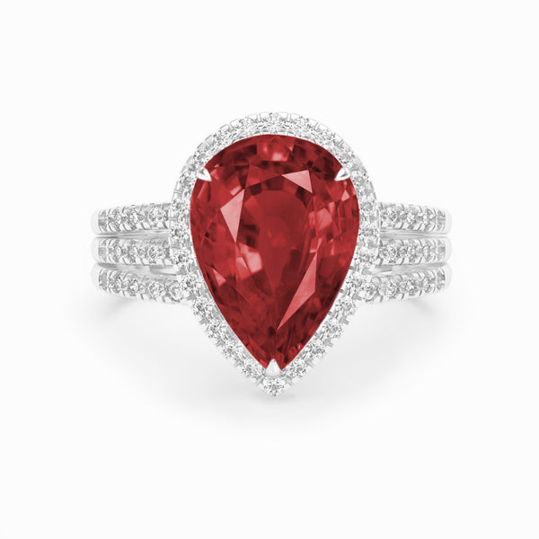 Pear ruby and diamond claw set ring