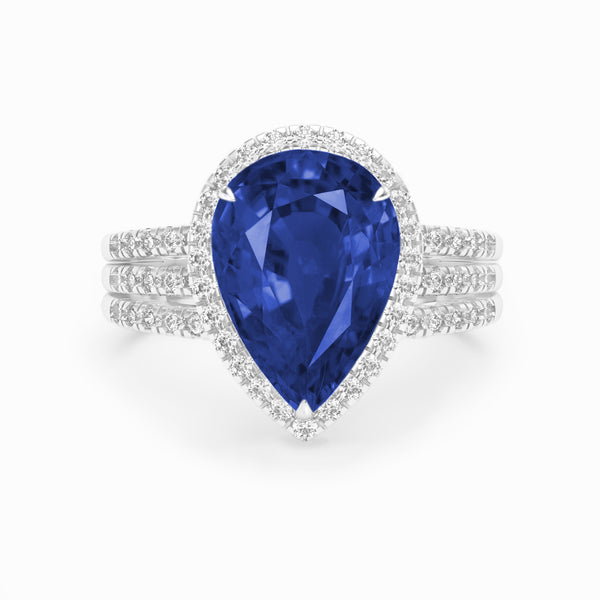 Pear sapphire and diamond claw set 18k white gold ring