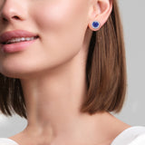 Round sapphire and diamond bezel set earrings on model