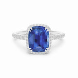 Cushion sapphire and diamond platinum engagement ring