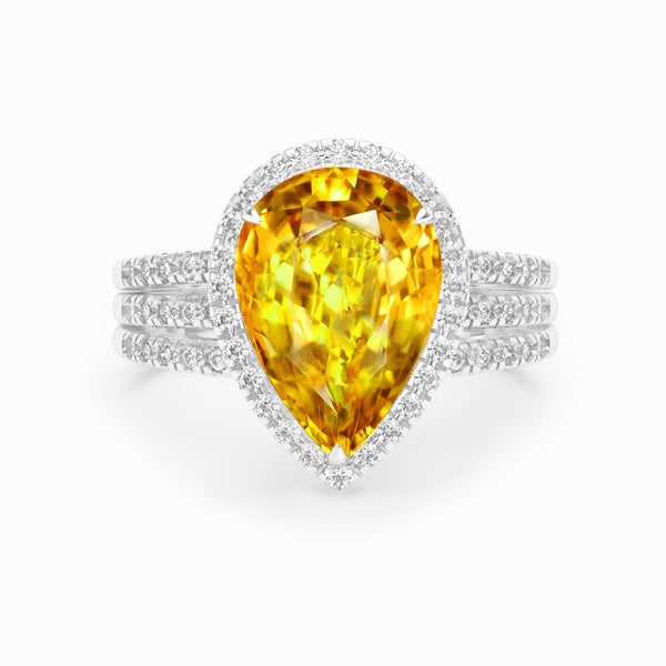 Pear yellow sapphire and diamond claw set 18k white gold ring