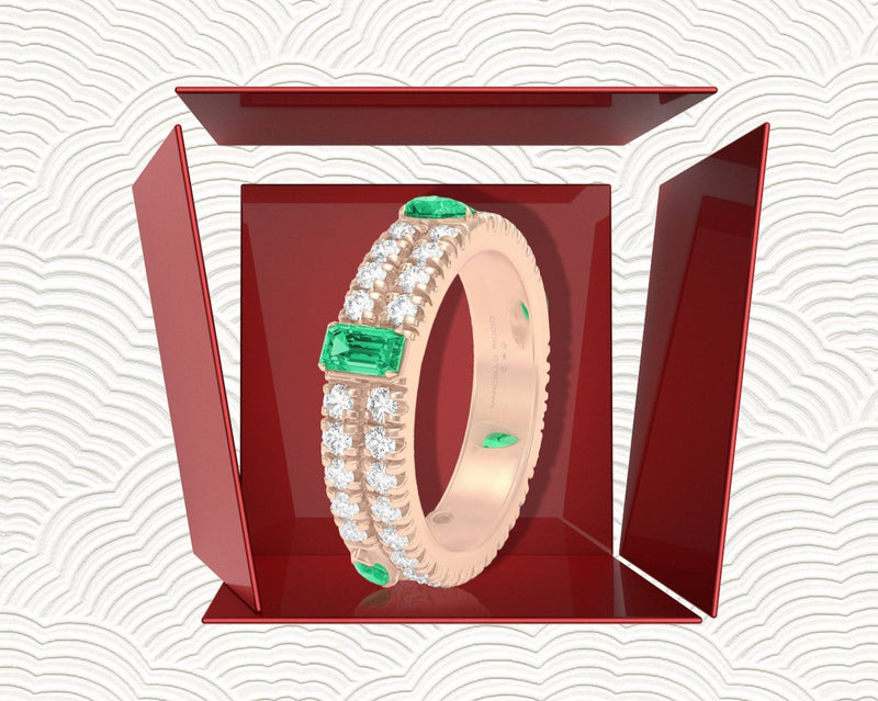 Christmas box with emerald and diamonds eternity ring in rose gold