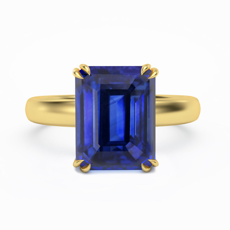 Sapphire claw set solitaire engagement ring, 18K Yellow Gold