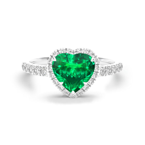 Heart shape emerald and diamonds halo ring in white gold